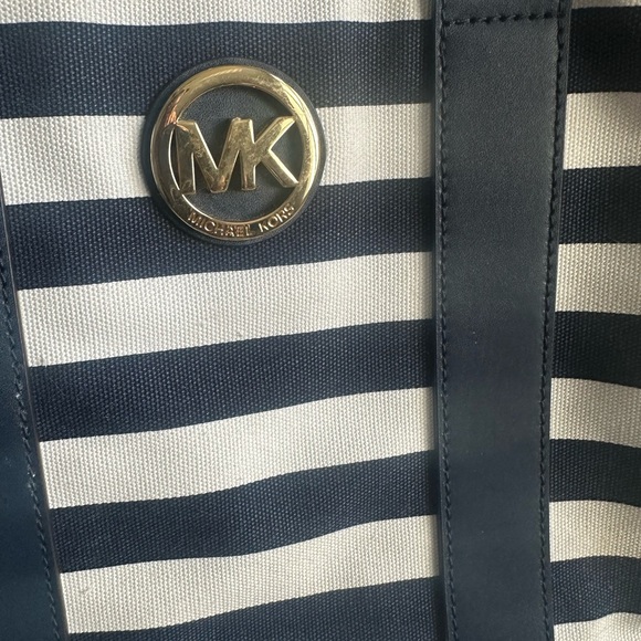 Michael Kors Navy and Cream Striped Tote stuffed with jewelry and skincare - Picture 4 of 10